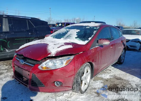 2013 Ford Focus Titanium z USA, uszkodzony, nr VIN 1FADP3N26DL150133